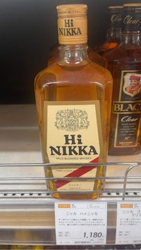 a bottle of hi nikka is on display in a store