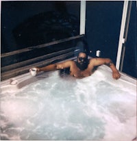 a man in a hot tub