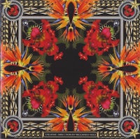 a black scarf with red and orange flowers on it